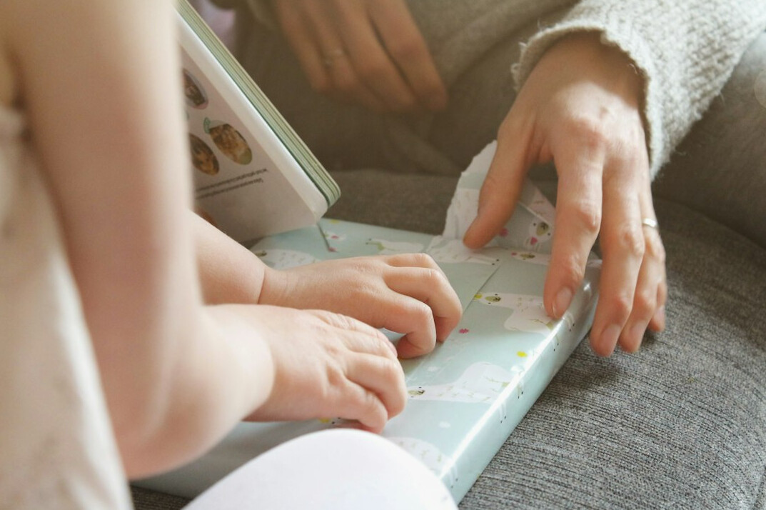 grandparents teaching kids board game