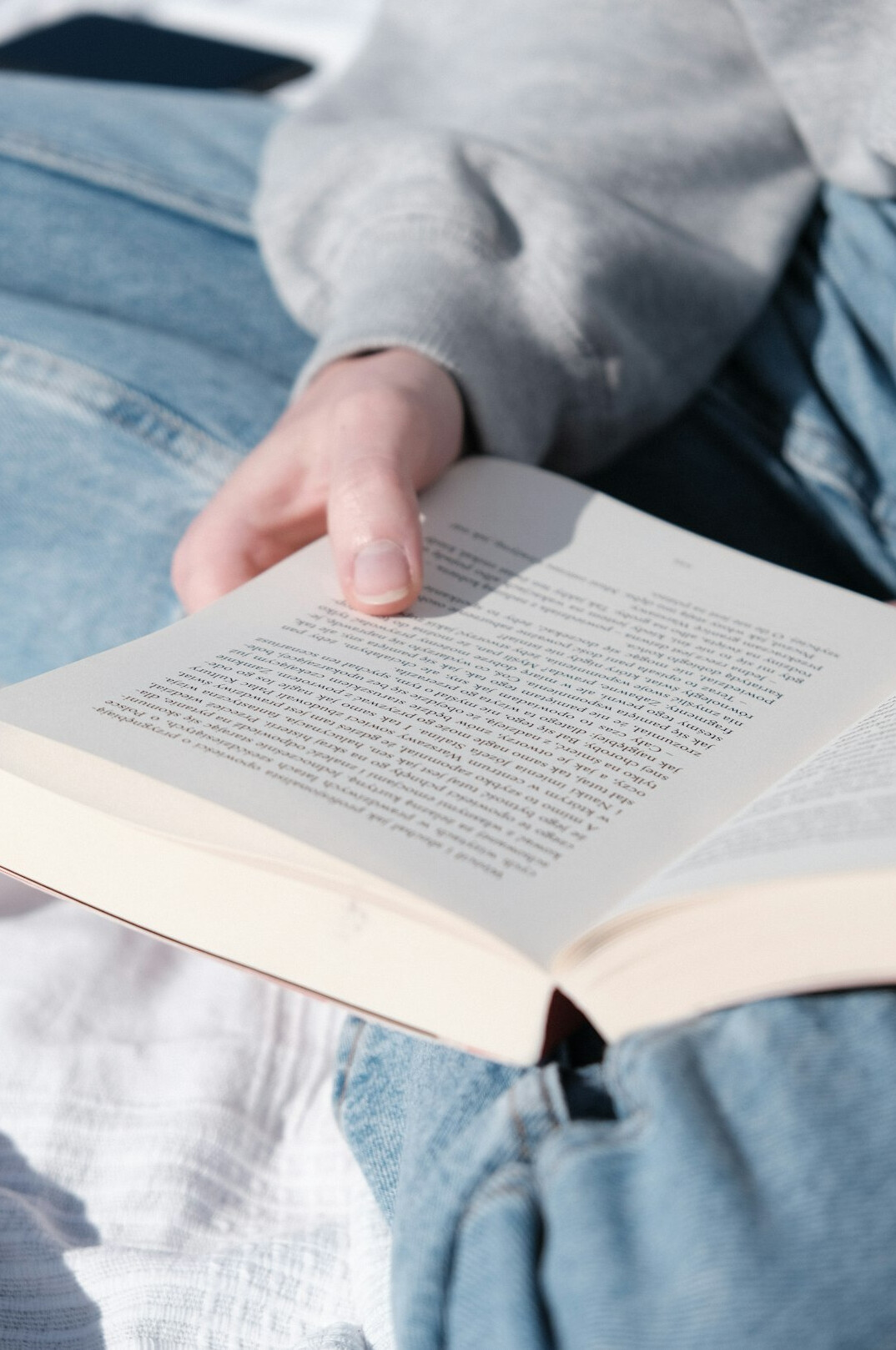 person reading old book