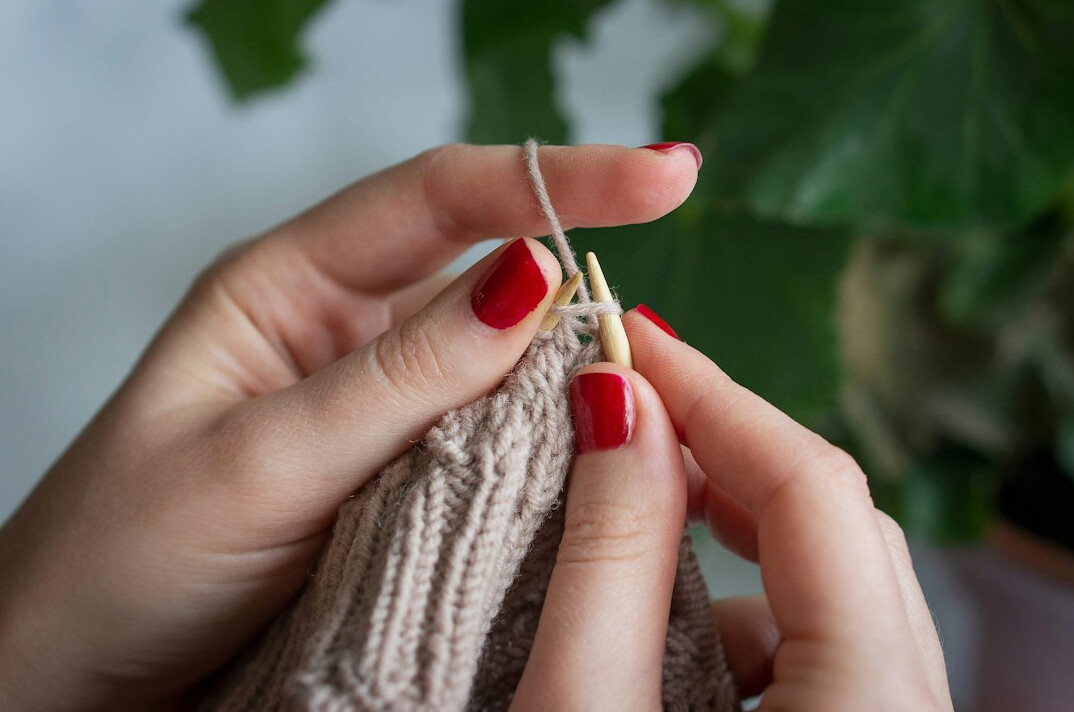 woman knitting sweater